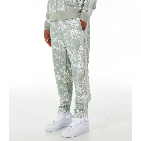 nike sportswear all over print track pants